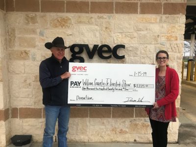 Tankersley presents a $1,225 donation to Mark Wehe of the 2019 Wilson County Junior Livestock Show, agriculture in the Guadalupe Valley
