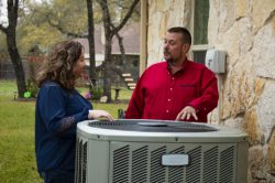HVAC Technician Explaining Payback Program in Cuero, TX